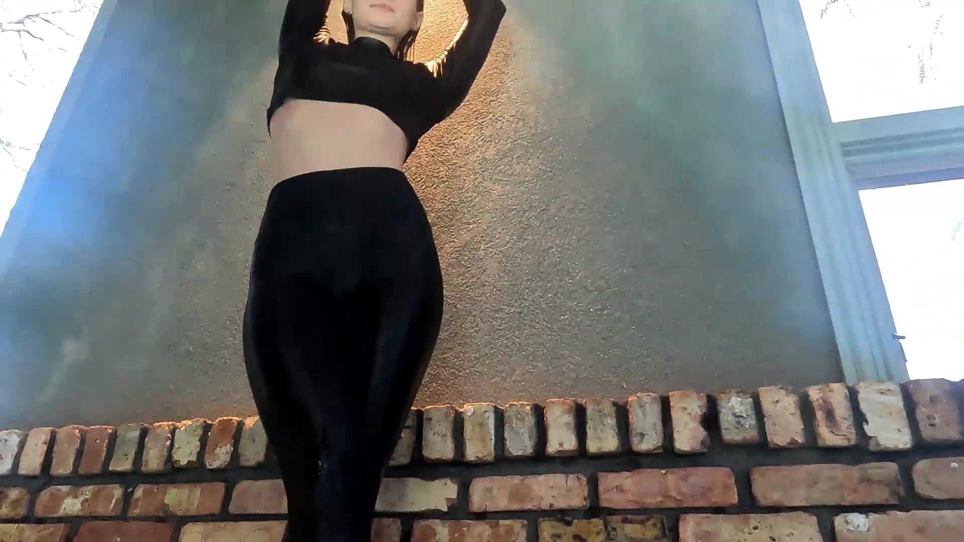 Lilith Swims in Leggings, Boots and Leather Jacket