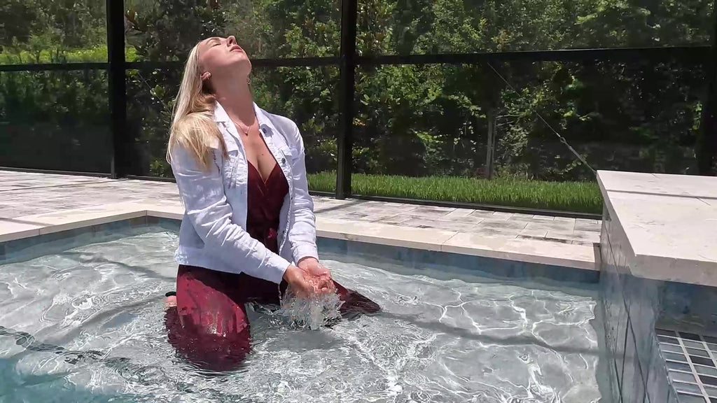 Mandi Enjoys the Pool Wearing Red and White