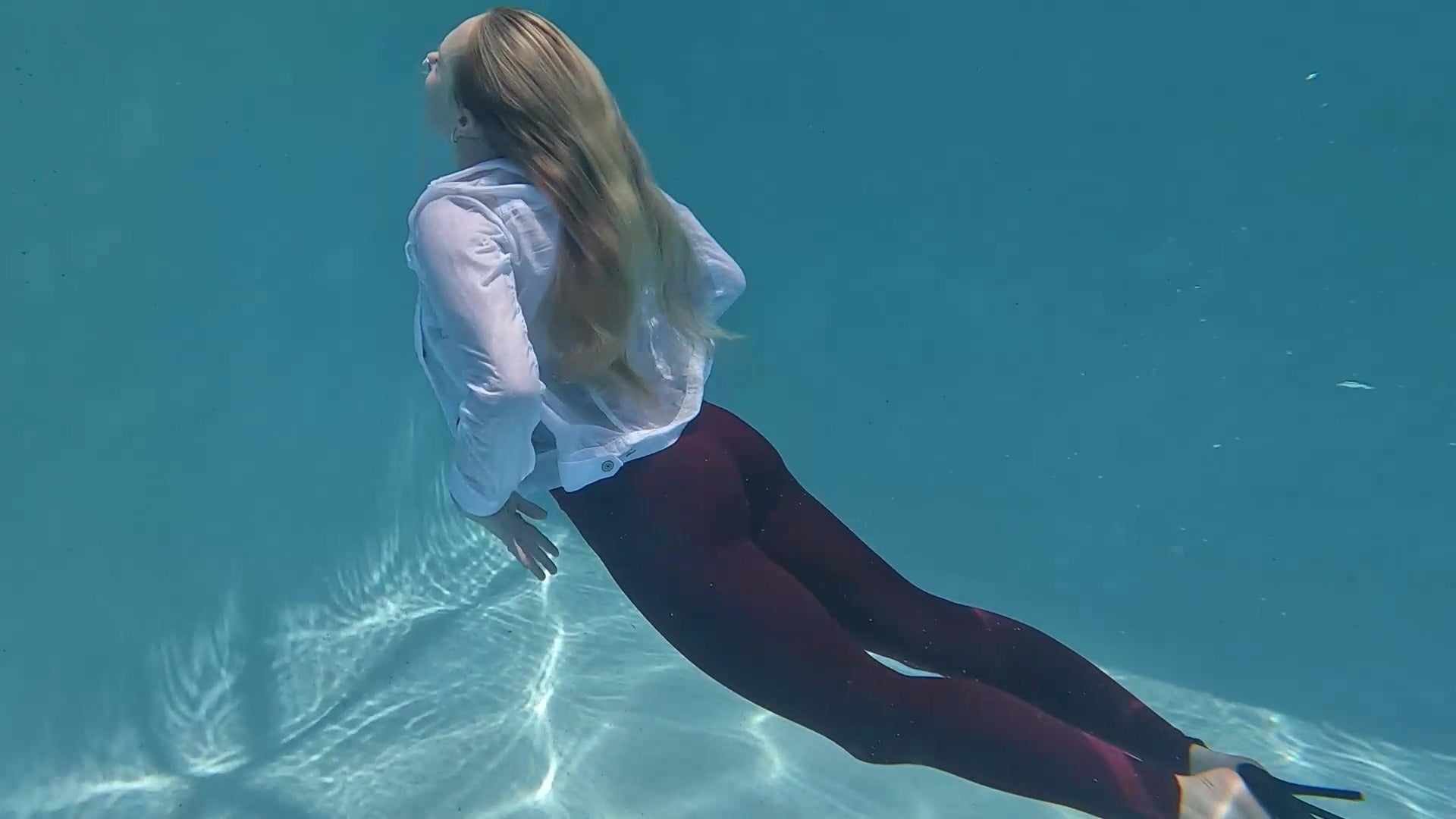 Mandi Enjoys the Pool Wearing Red and White