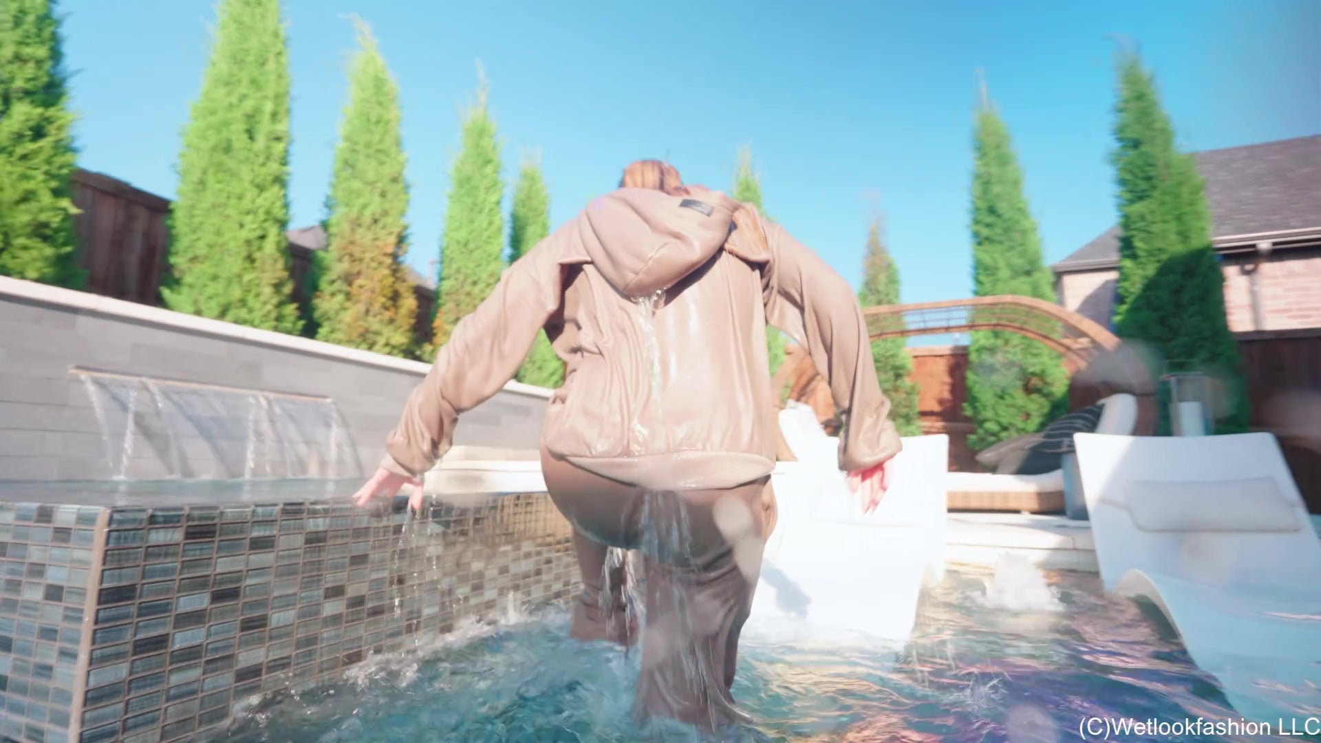 Mandi Falls in the Pool While Cleaning