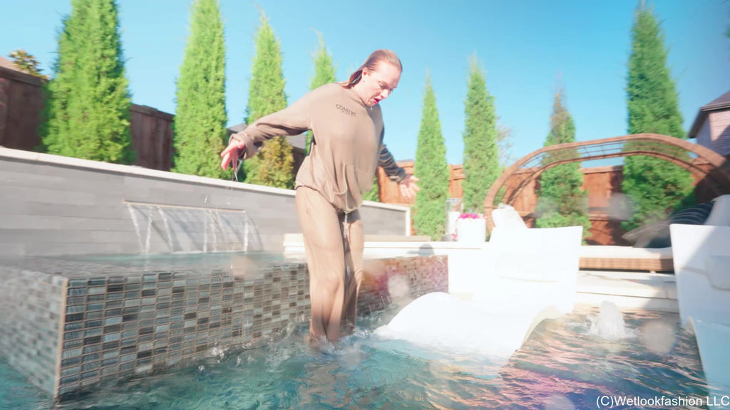 Mandi Falls in the Pool While Cleaning