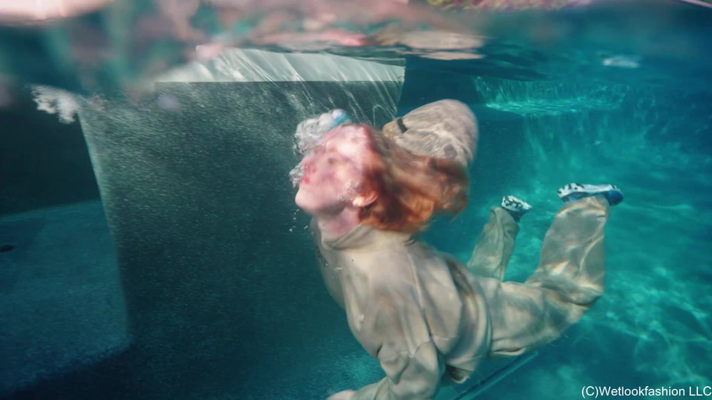 Mandi Falls in the Pool While Cleaning