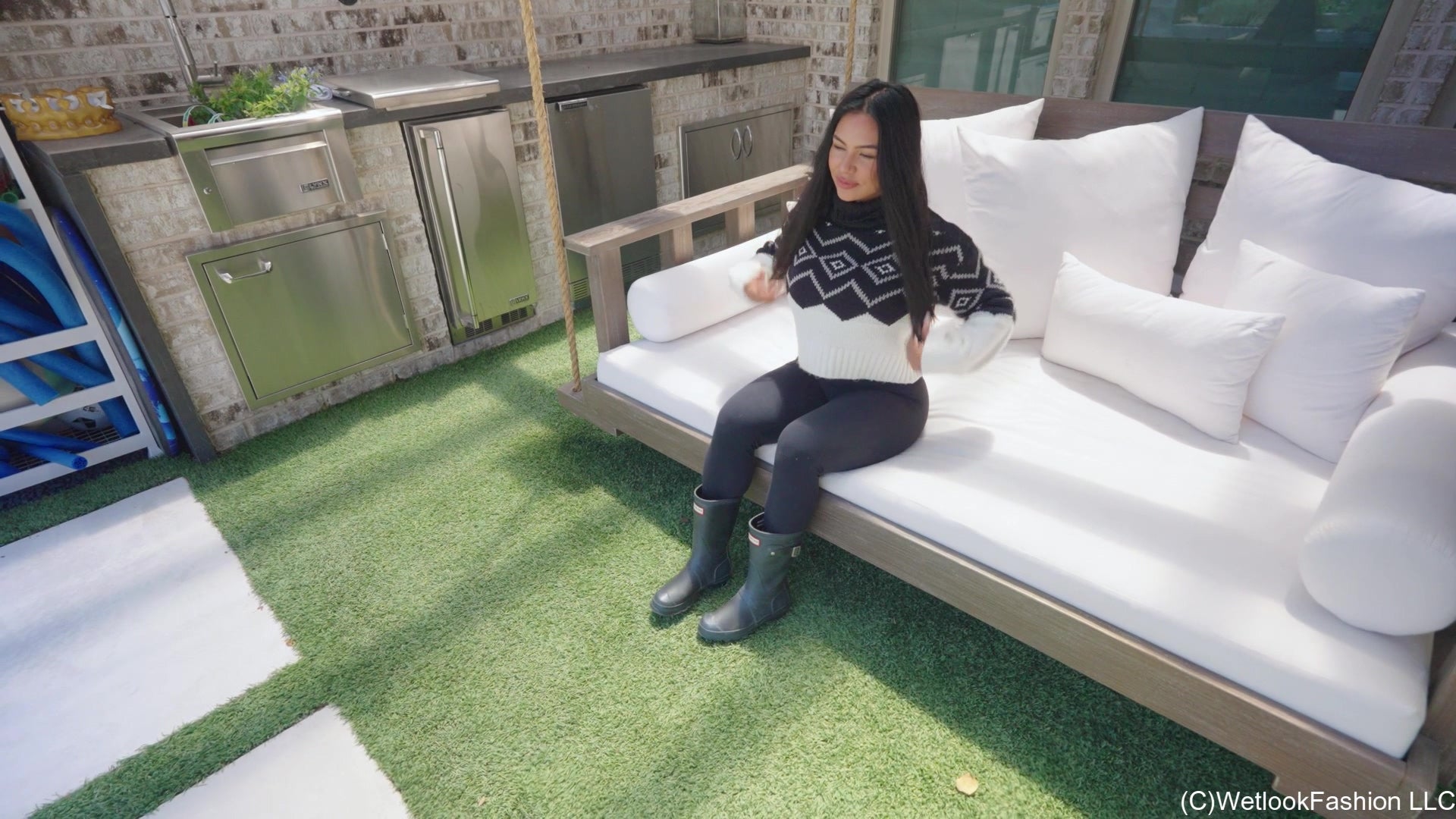 Maria in the Pool Wearing Leggings, Sweater and Boots