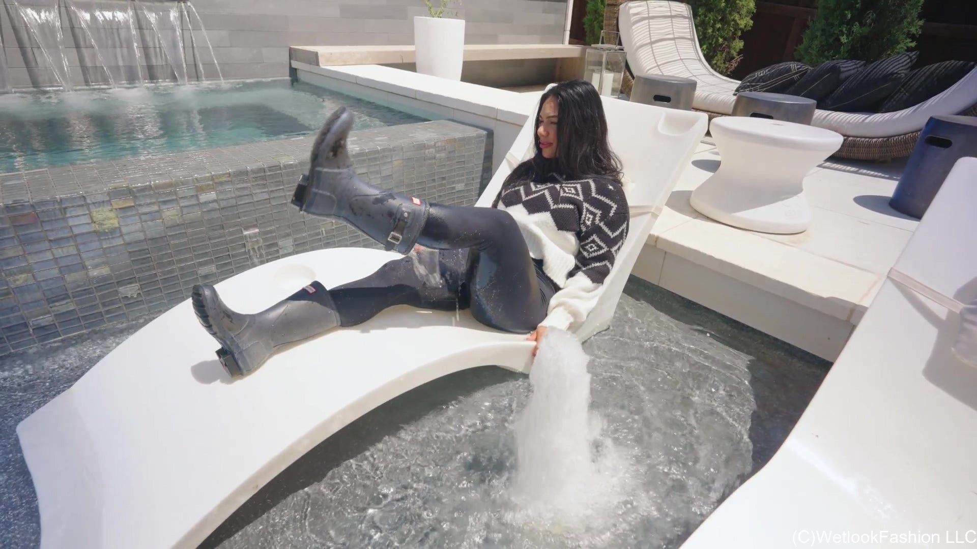 Maria in the Pool Wearing Leggings, Sweater and Boots