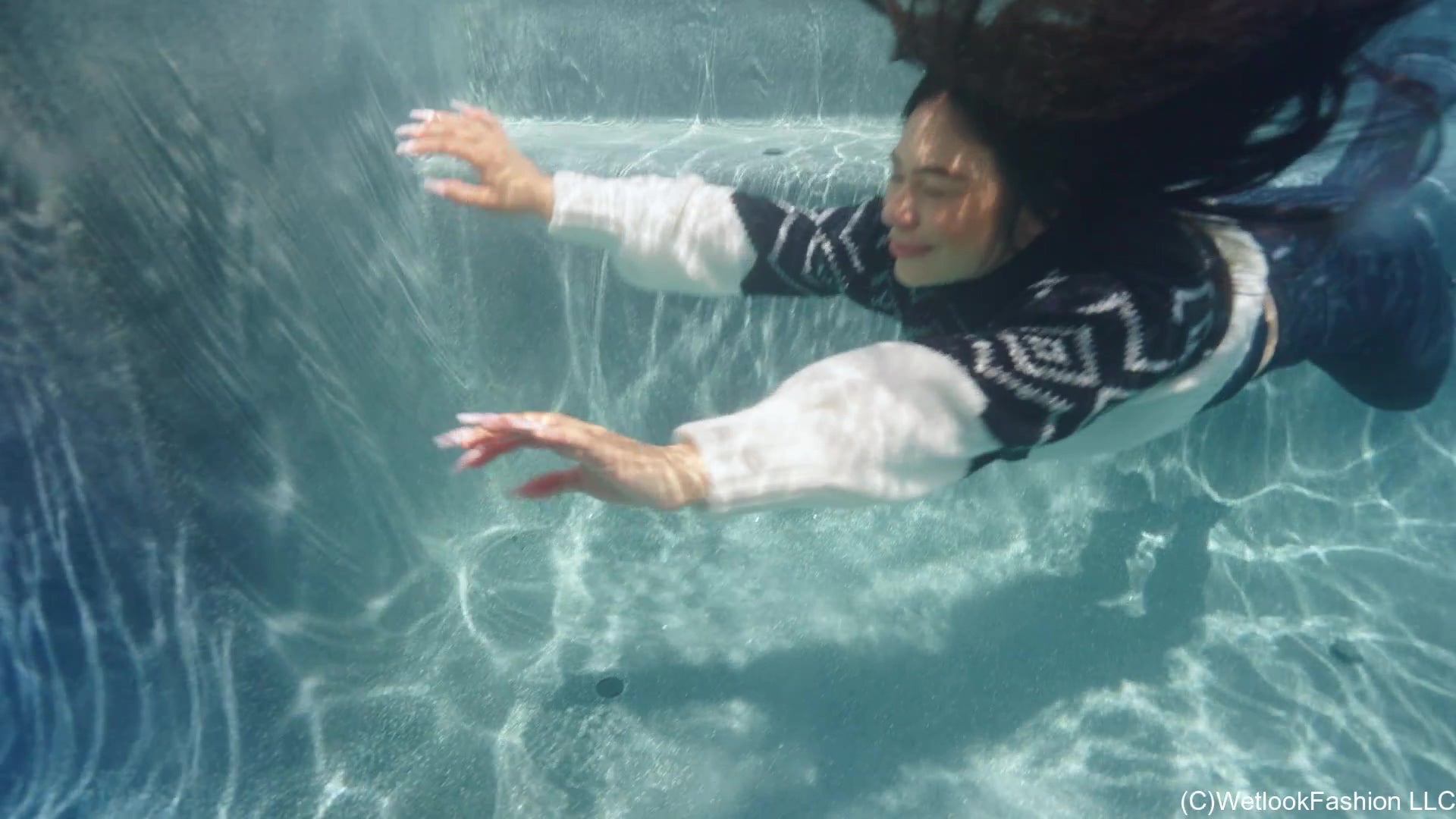 Maria in the Pool Wearing Leggings, Sweater and Boots