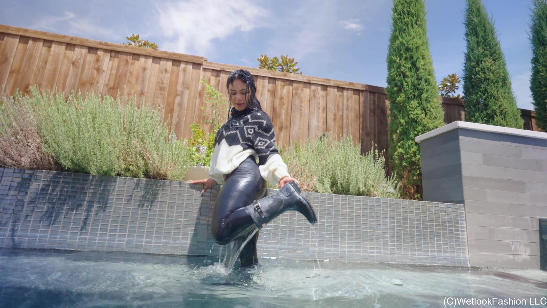 Maria in the Pool Wearing Leggings, Sweater and Boots