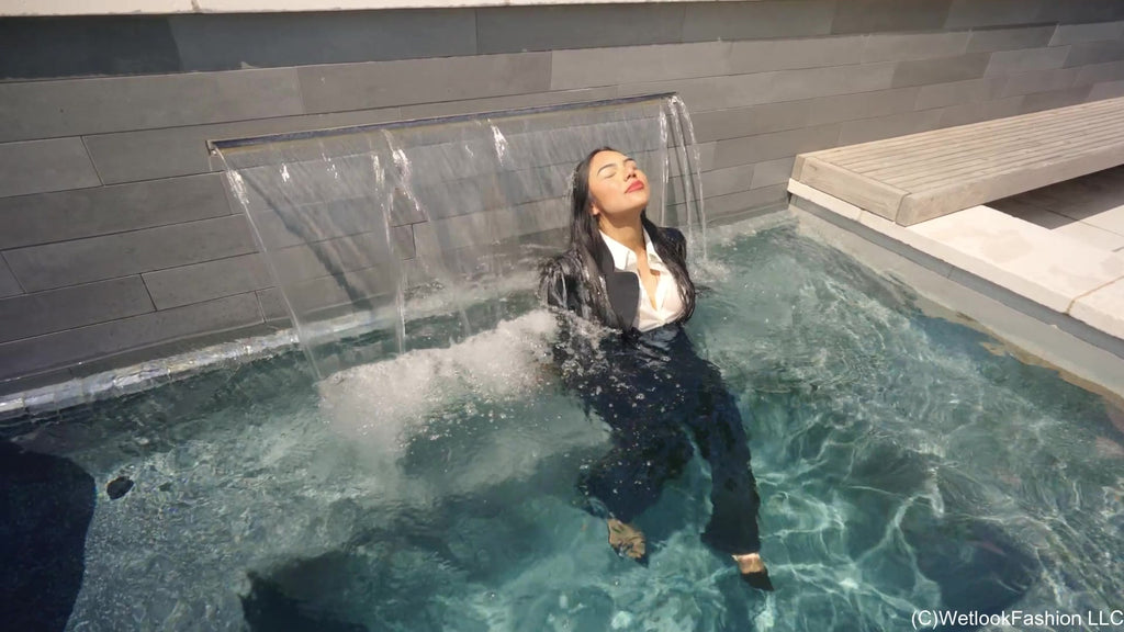 Maria Swims and Showers in a Business Outfit
