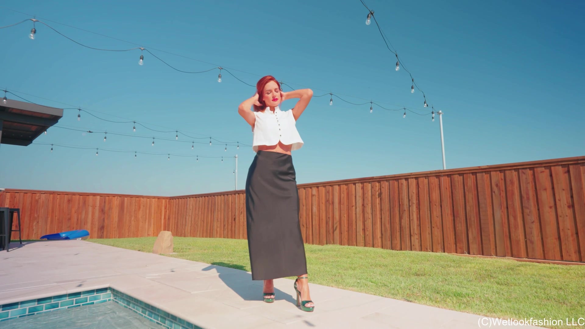 Mariela Goes for a Swim in a Satin Skirt, Vest and Heels