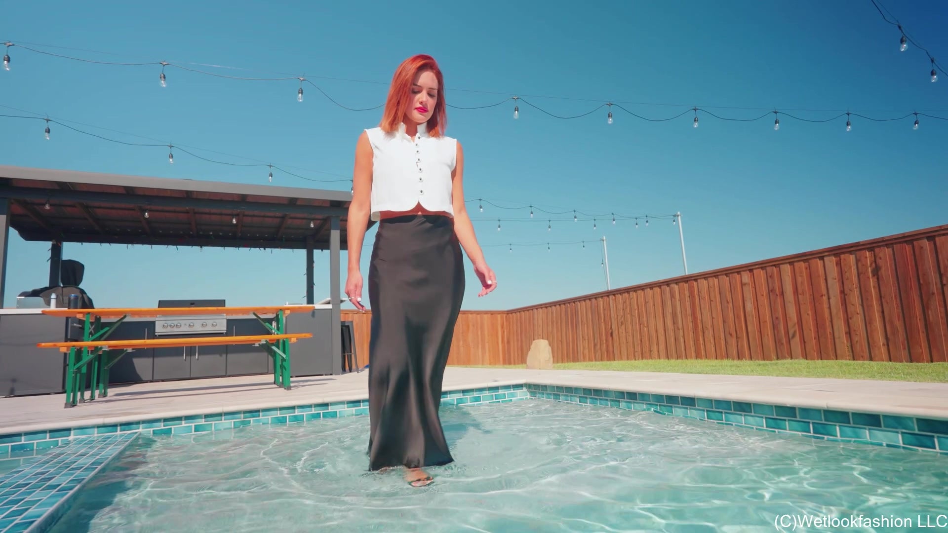 Mariela Goes for a Swim in a Satin Skirt, Vest and Heels