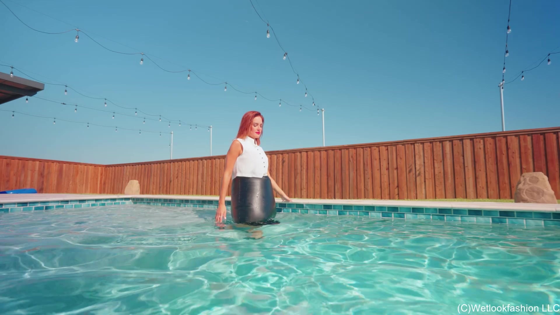 Mariela Goes for a Swim in a Satin Skirt, Vest and Heels