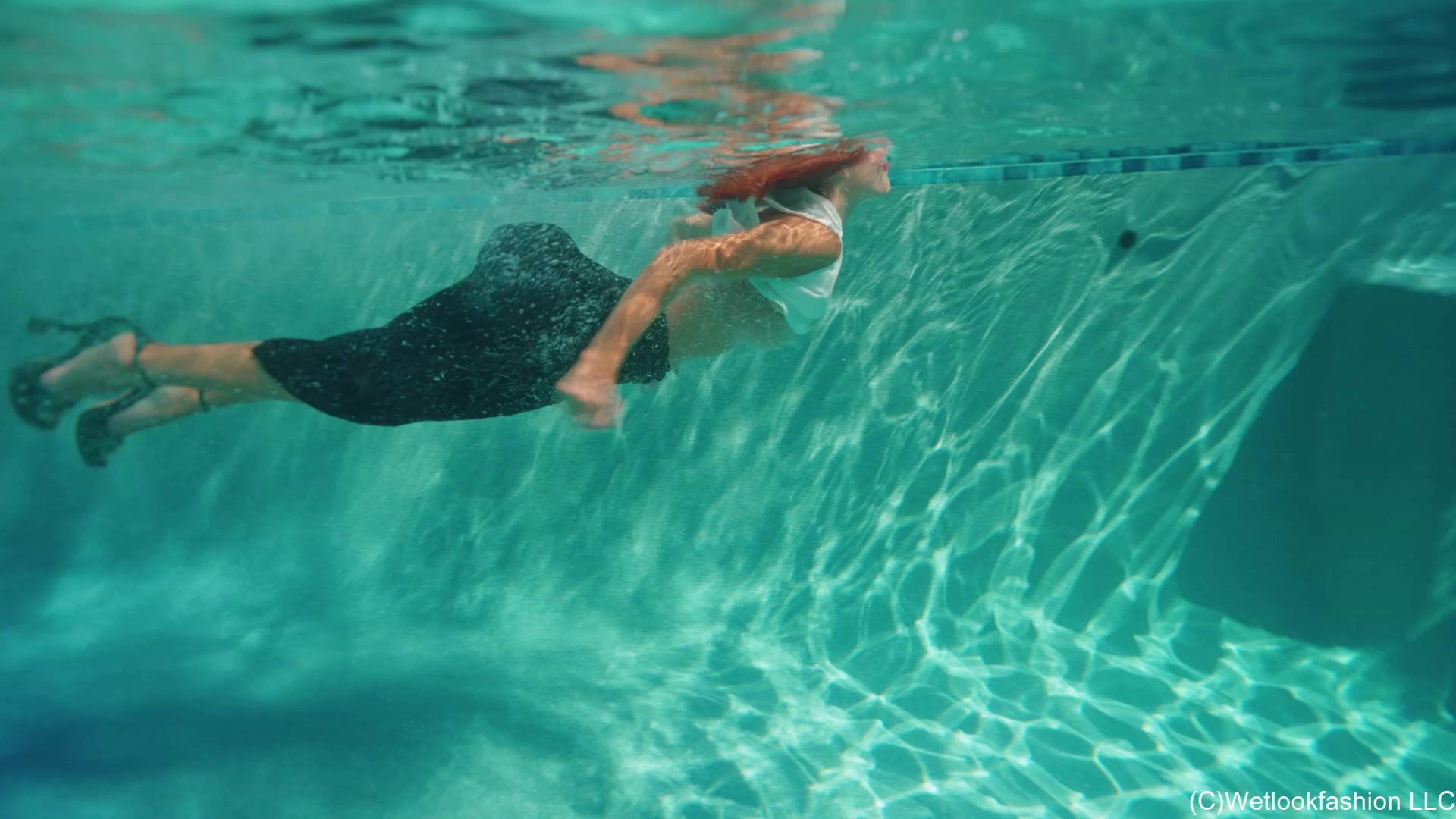 Mariela Goes for a Swim in a Satin Skirt, Vest and Heels