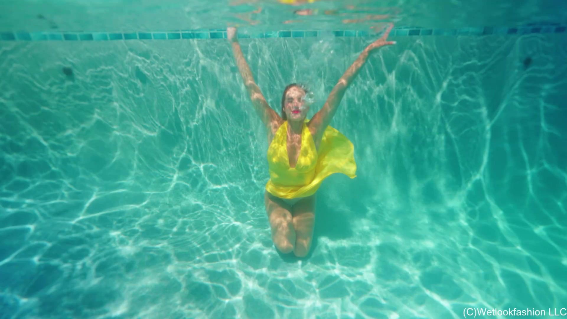 Mariela Goes for a Swim in A Sexy Yellow Satin Dress
