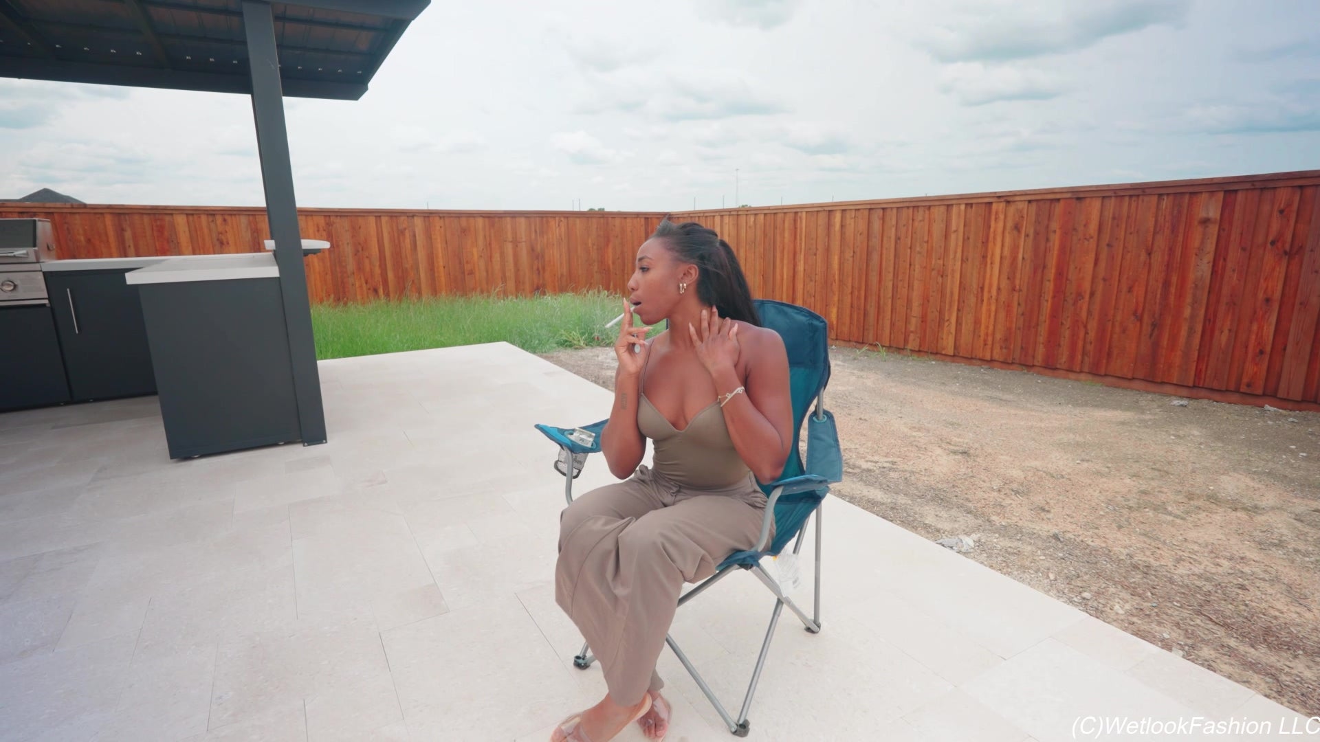 Naomi Is Smoking and Swimming in a Pantsuit