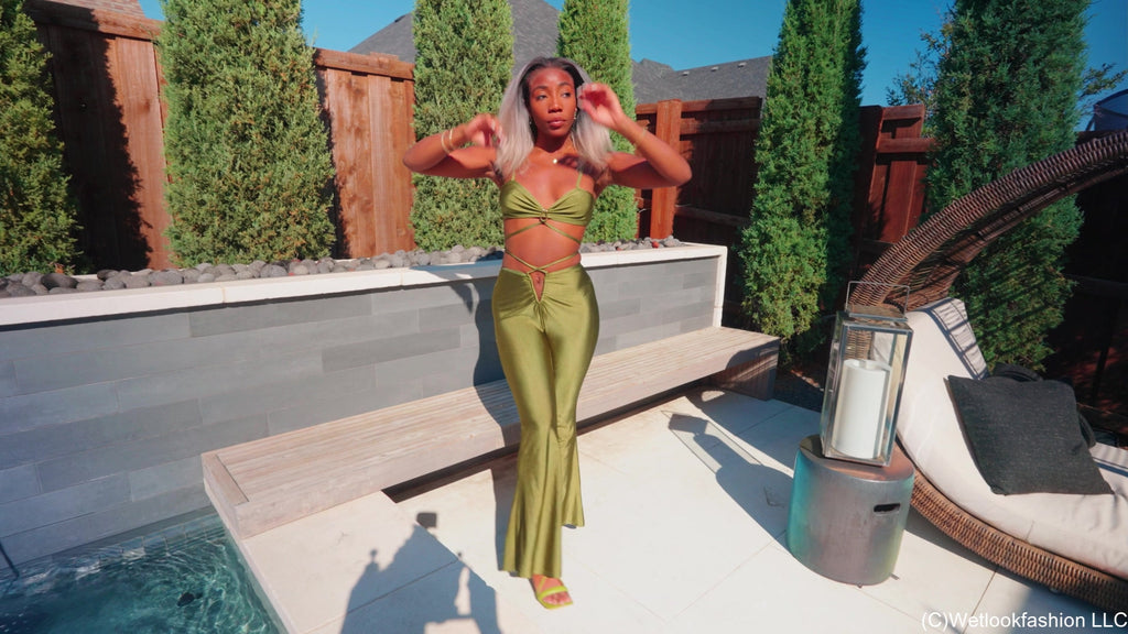 Naomi Swims in a Shiny Lucky Green Outfit