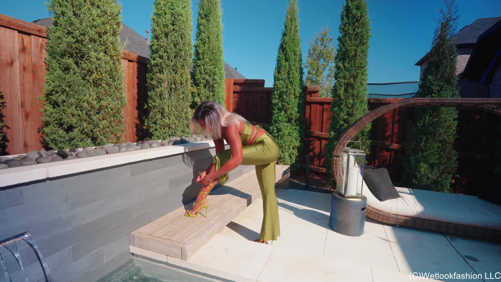 Naomi Swims in a Shiny Lucky Green Outfit