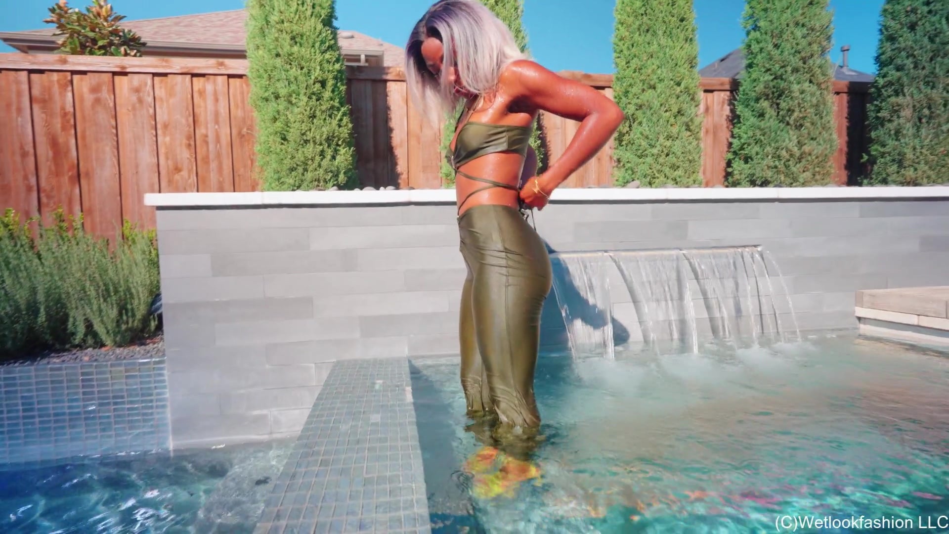 Naomi Swims in a Shiny Lucky Green Outfit
