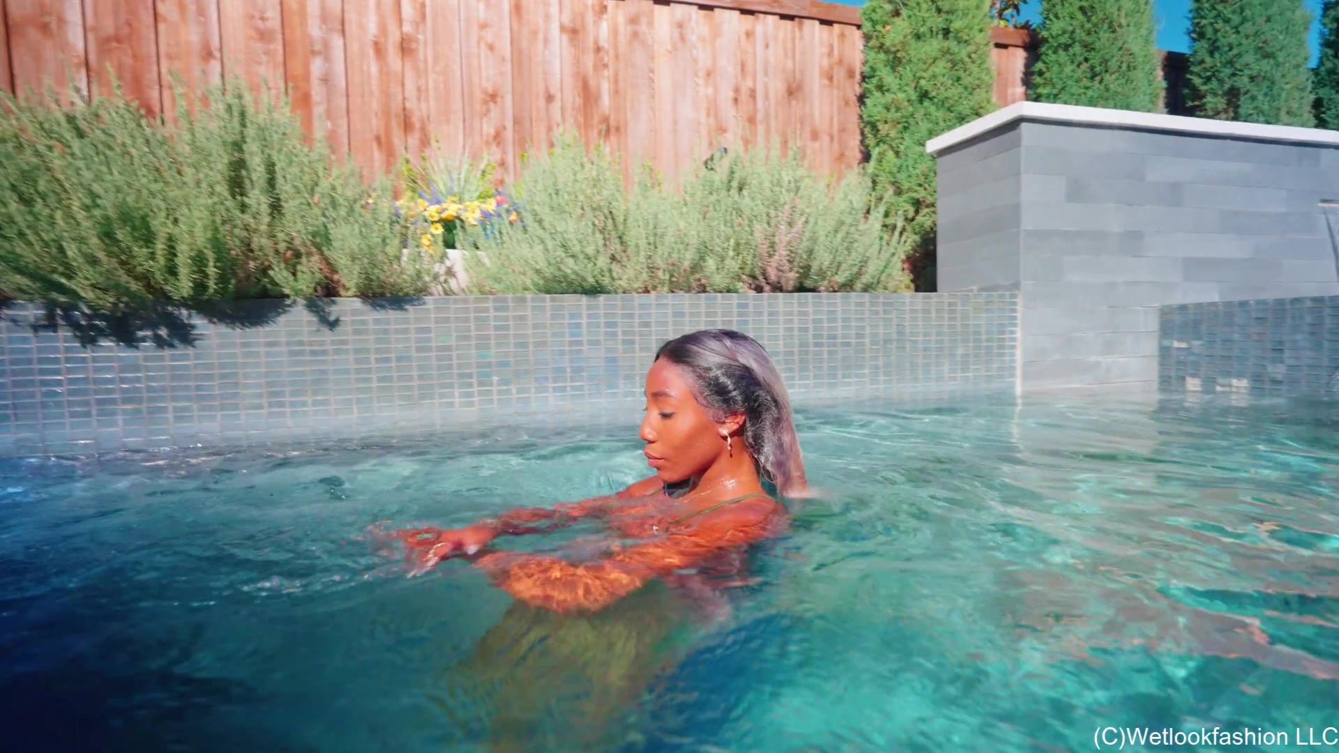 Naomi Swims in a Shiny Lucky Green Outfit