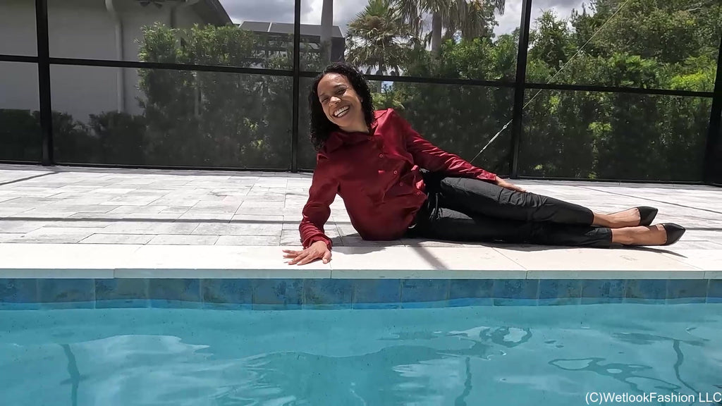 Natalie Swims in a Red and Black Business Outfit