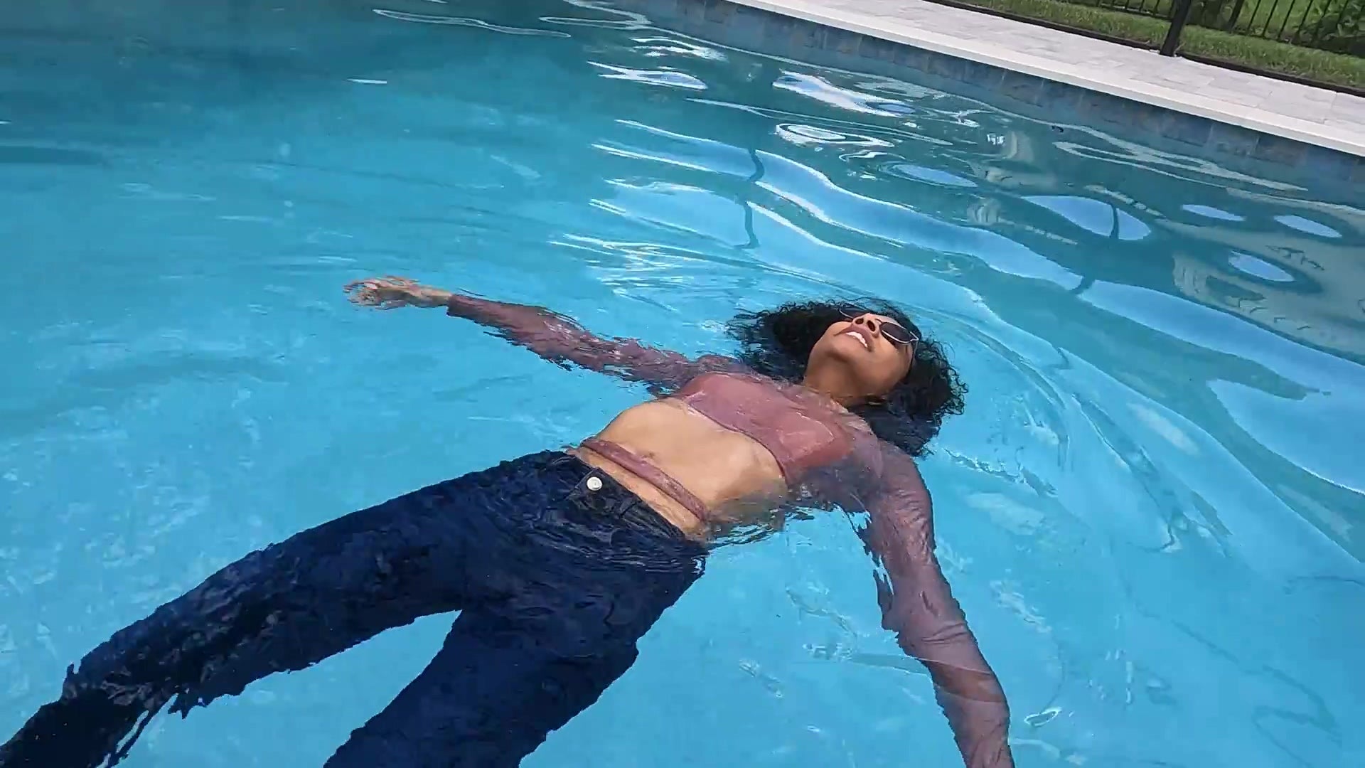 Natalie Swims in Jeans