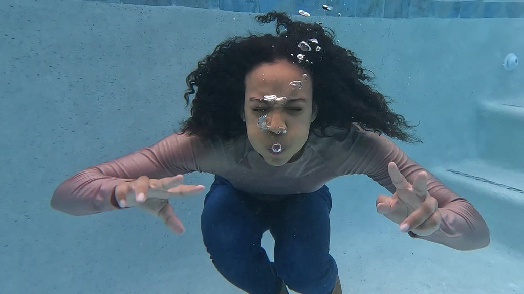 Natalie Swims in Jeans