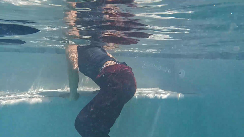 Natalie Swims in Maroon Pants and Sleeveless Shirt