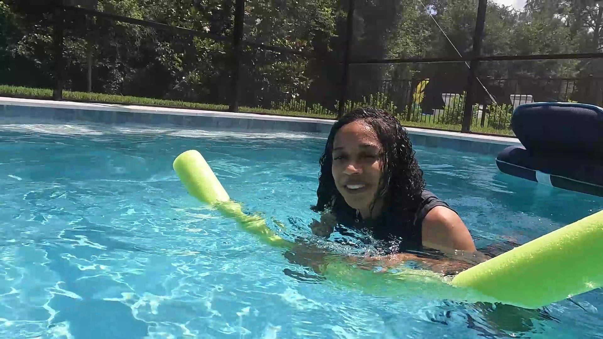 Natalie Swims in Maroon Pants and Sleeveless Shirt