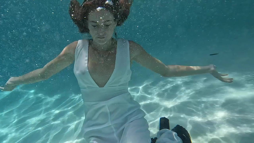 Nathalia Takes a Dip in Her White Formal Jumpsuit