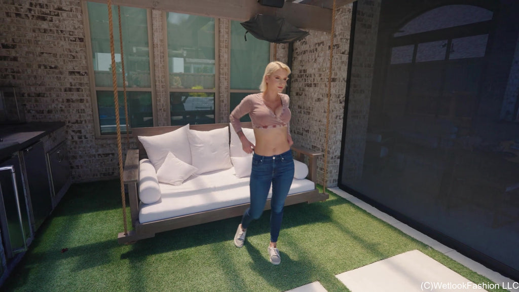 Natasha Gets Wet in a Casual Jeans Outfit