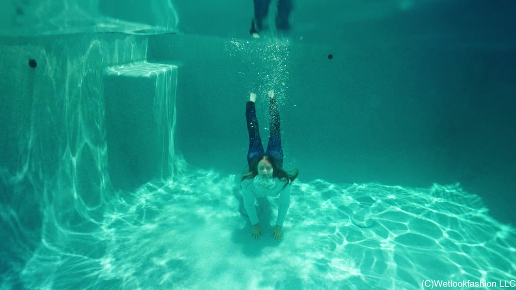 Danielle Goes for a Swim in Winter Clothes