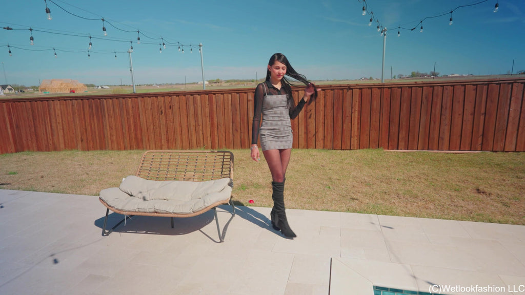 New Model Nicole Swims in a Hot Dress, Tights and Boots