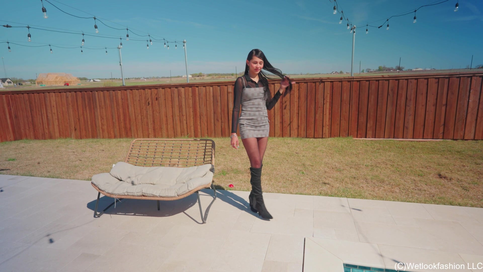 New Model Nicole Swims in a Hot Dress, Tights and Boots