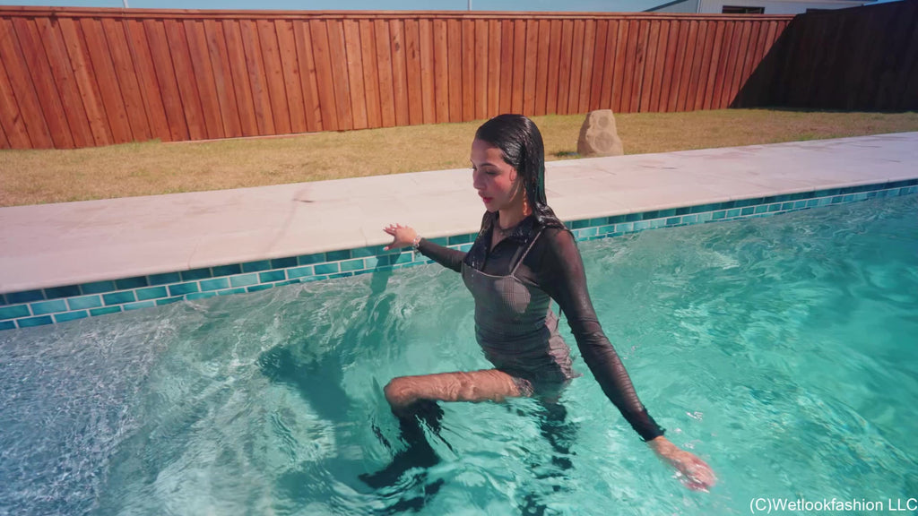 New Model Nicole Swims in a Hot Dress, Tights and Boots