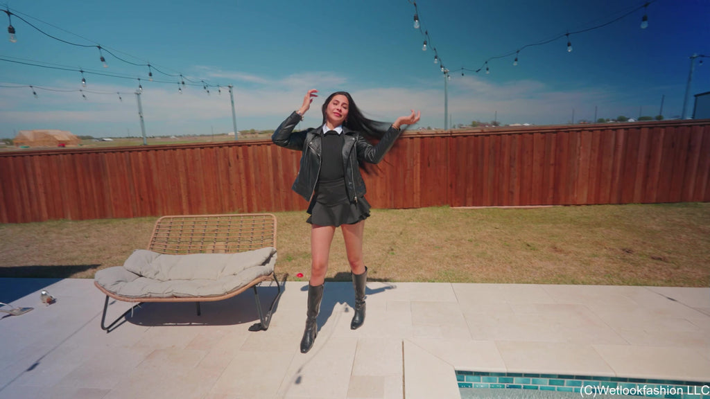 Nicole Gets Wet in a Skirt Outfit with a Leather Jacket