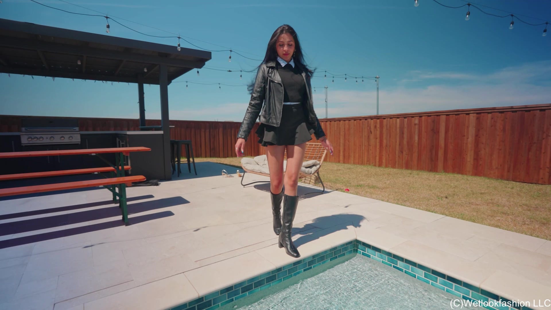 Nicole Gets Wet in a Skirt Outfit with a Leather Jacket