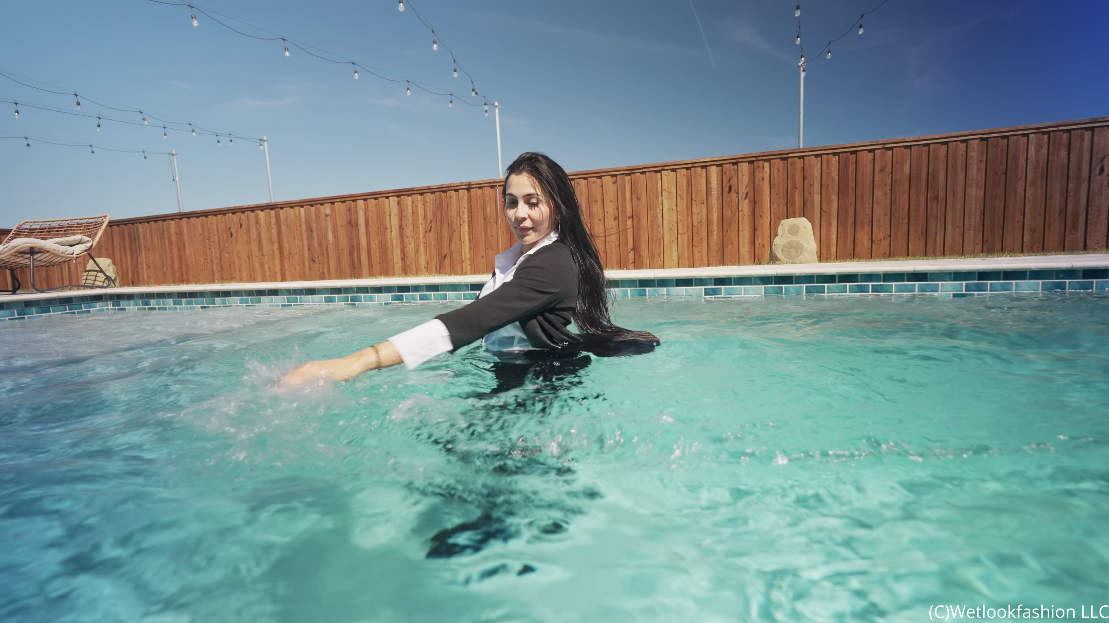 Nicole Goes for a Swim in a Hot Business Outfit