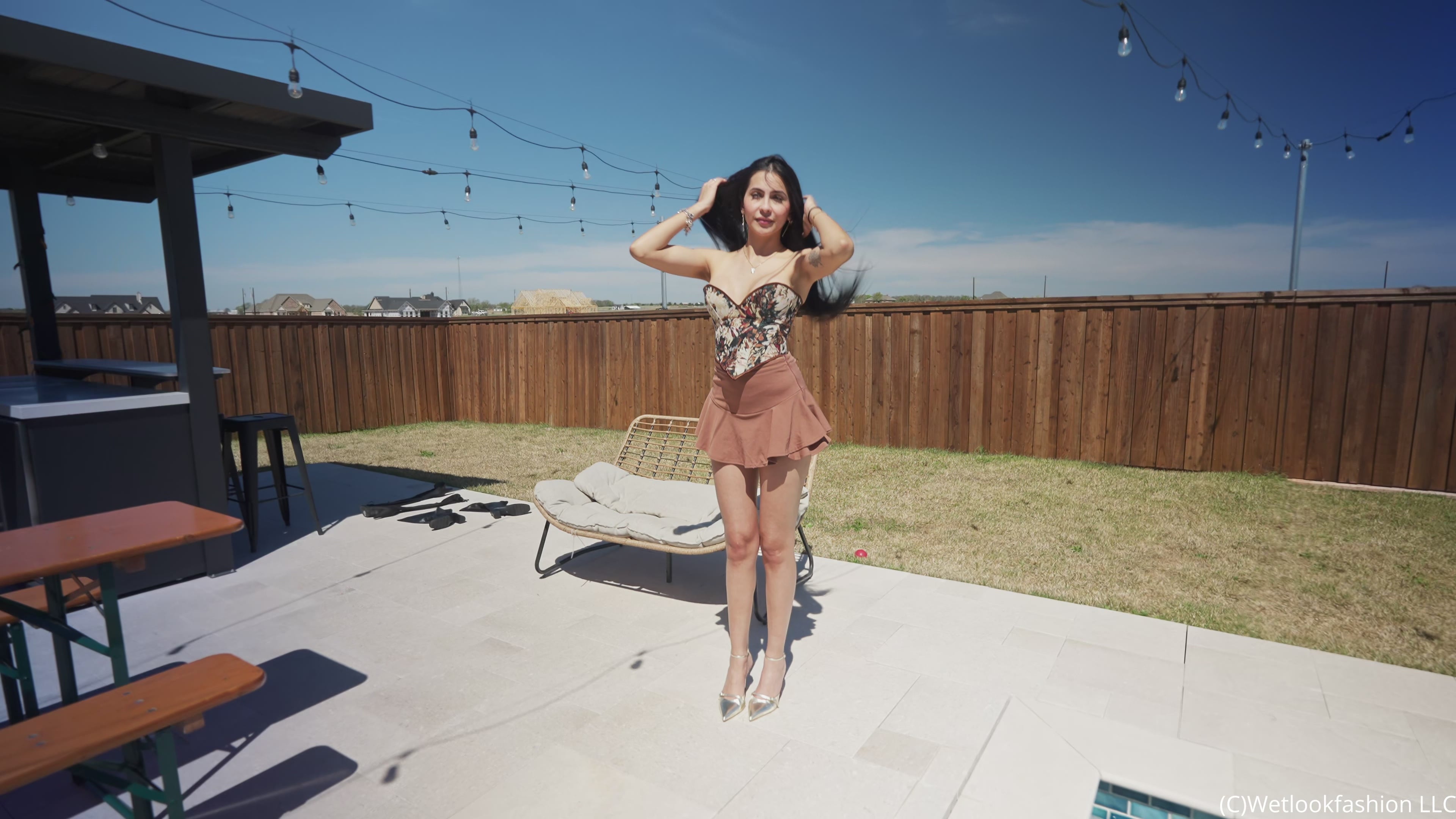Nicole takes a Dip in a Mini Skirt and a Floral Top