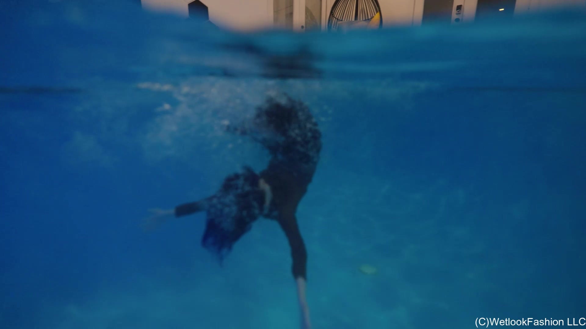 Petra Swims with You Wearing a Long Skirt and a Brown Top