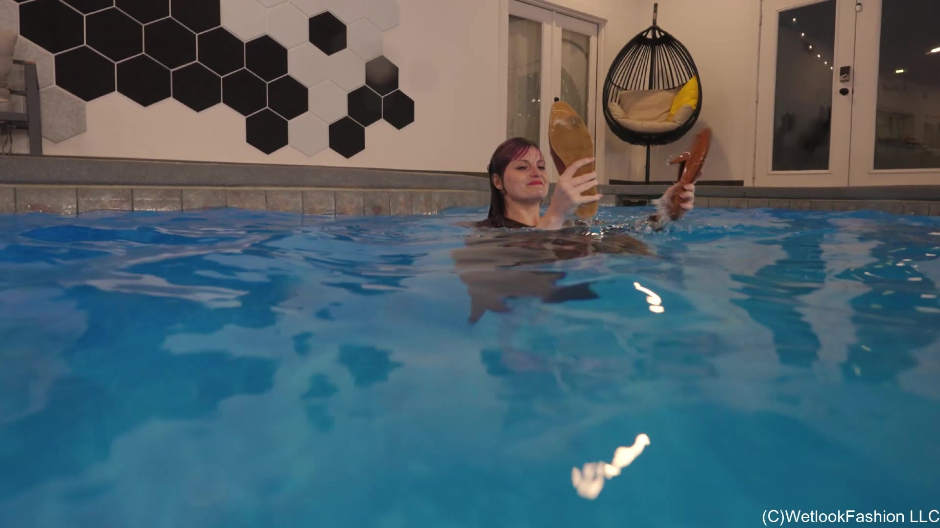 Petra Swims with You Wearing a Long Skirt and a Brown Top