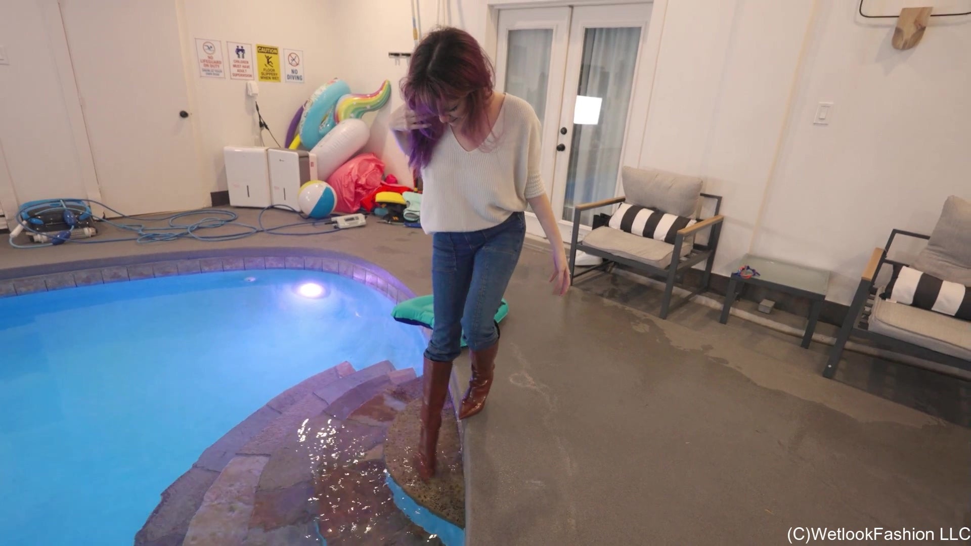 Petra Takes a Dip in Jeans, Sweater and Boots