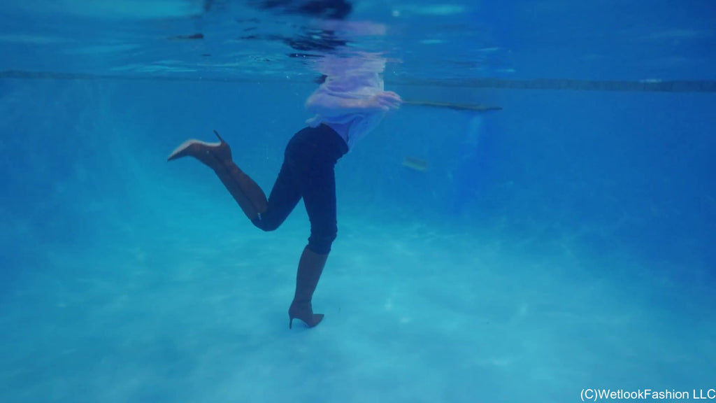Petra Takes a Dip in Jeans, Sweater and Boots
