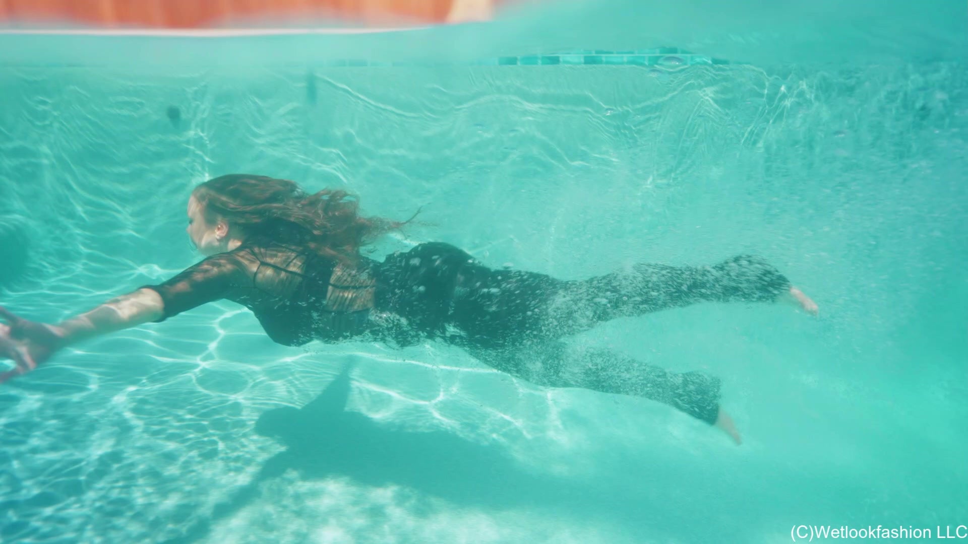 Presley Rocks the Pool in a Hot Leather Outfit