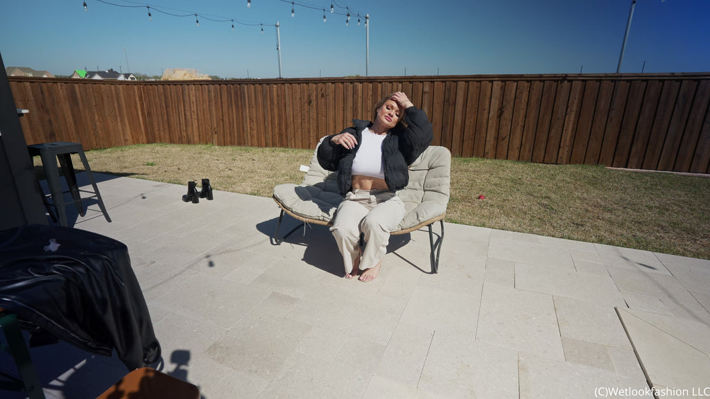 Presley Takes a Dip Wearing Pants, a Crop Top and a Jacket