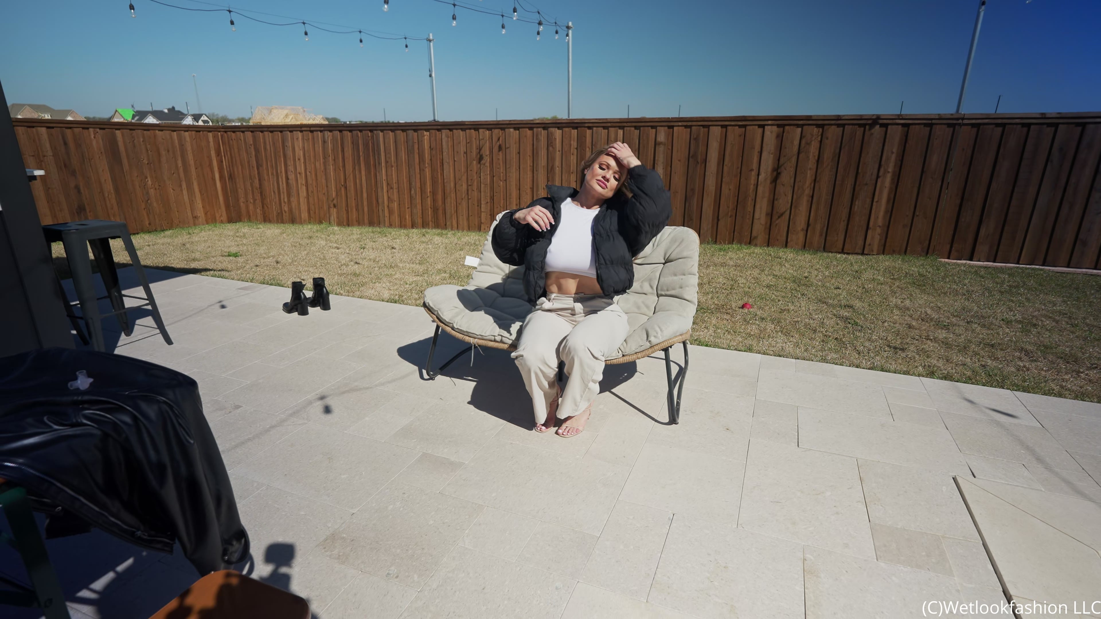 Presley Takes a Dip Wearing Pants, a Crop Top and a Jacket