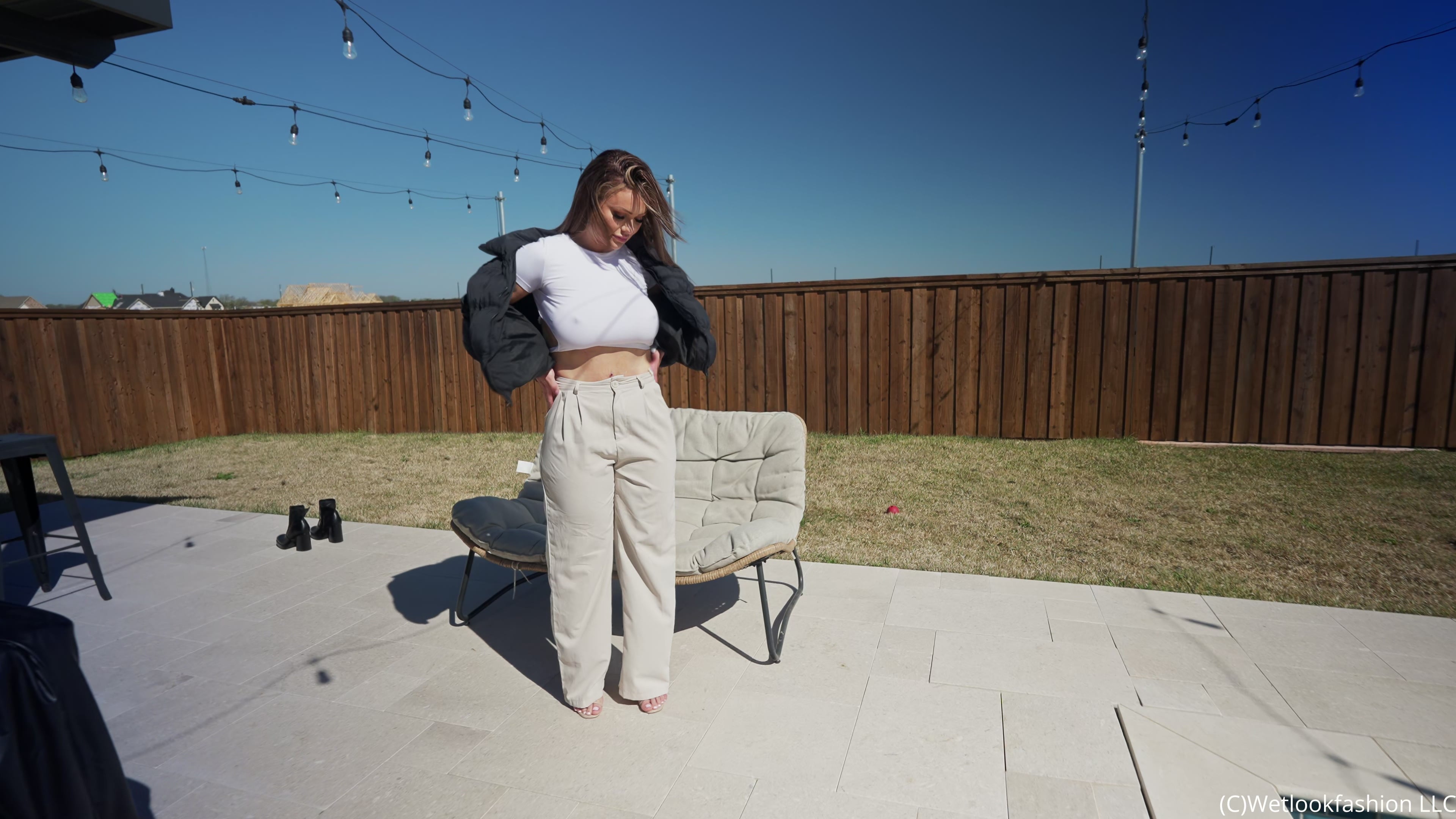 Presley Takes a Dip Wearing Pants, a Crop Top and a Jacket