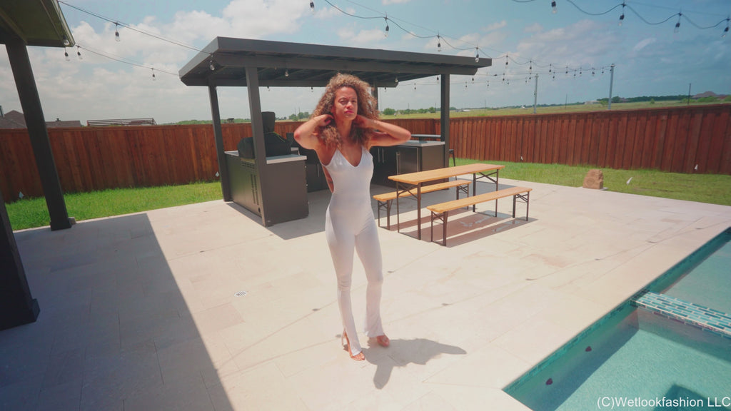 Jasmine Gets Wet in a White Jumpsuit and Heels