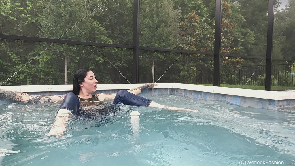 Lexie in the Pool Wearing Jeans, Crop Top and Flip Flops