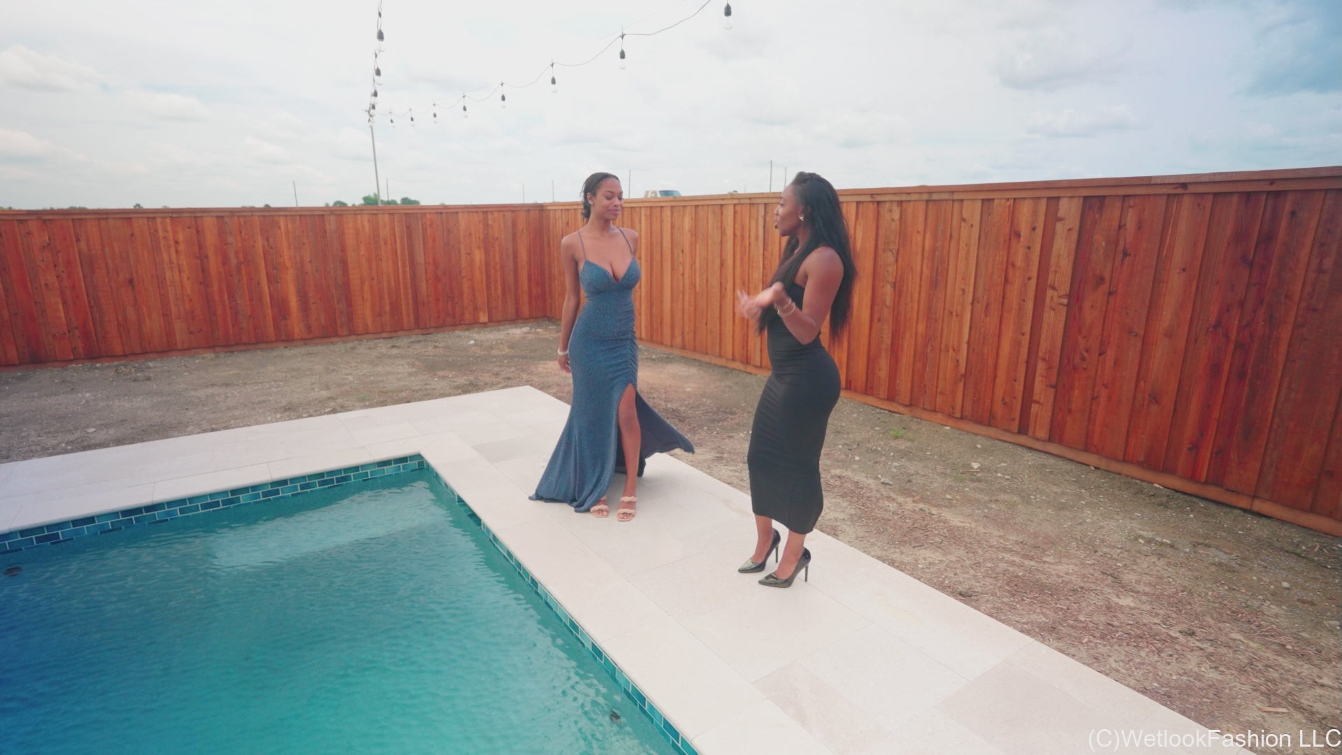 Amy and Naomi Are Having a Friendly Water Fight