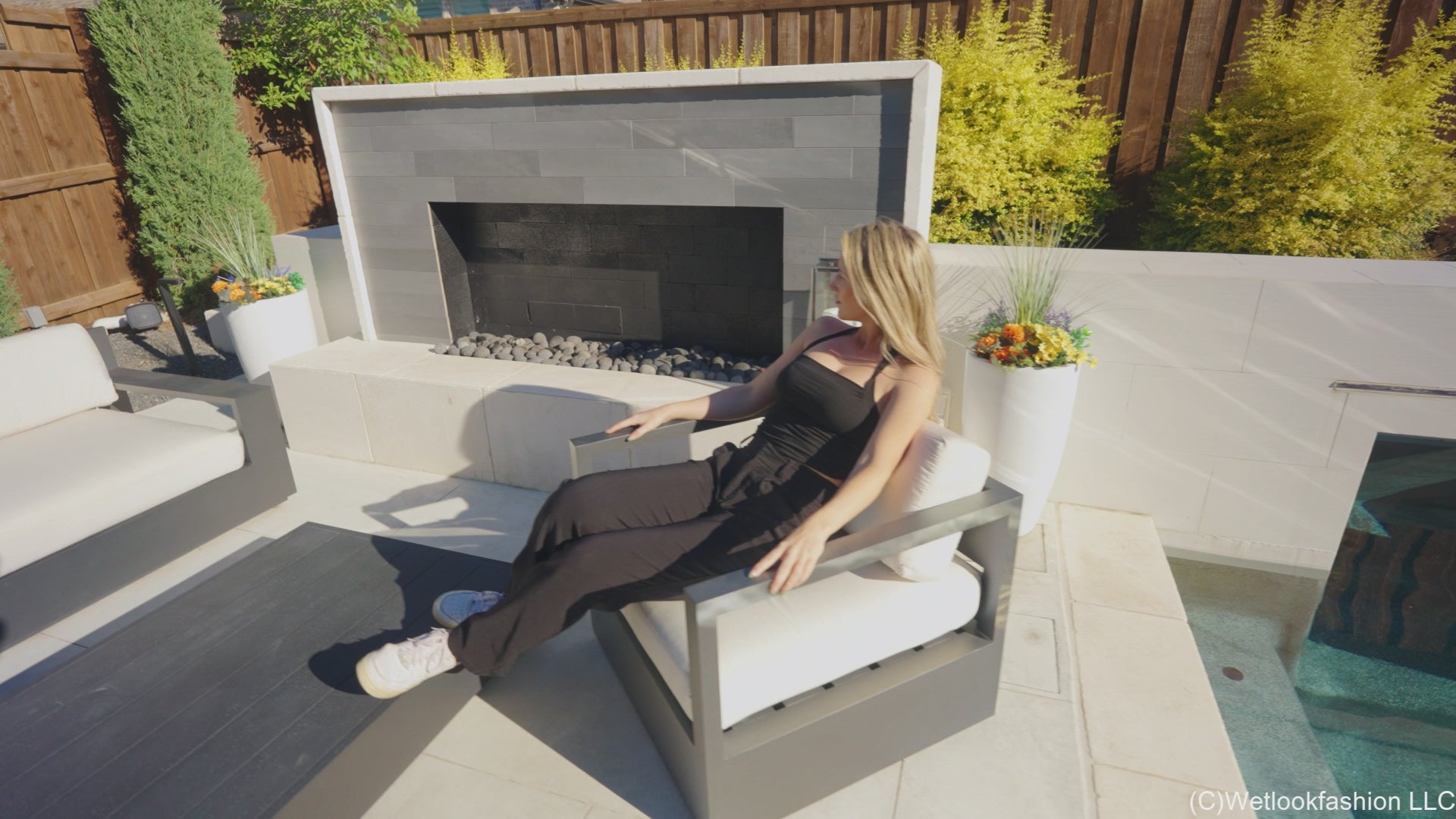 Kate Casuall Swims Wearing a Black Pant Outfit