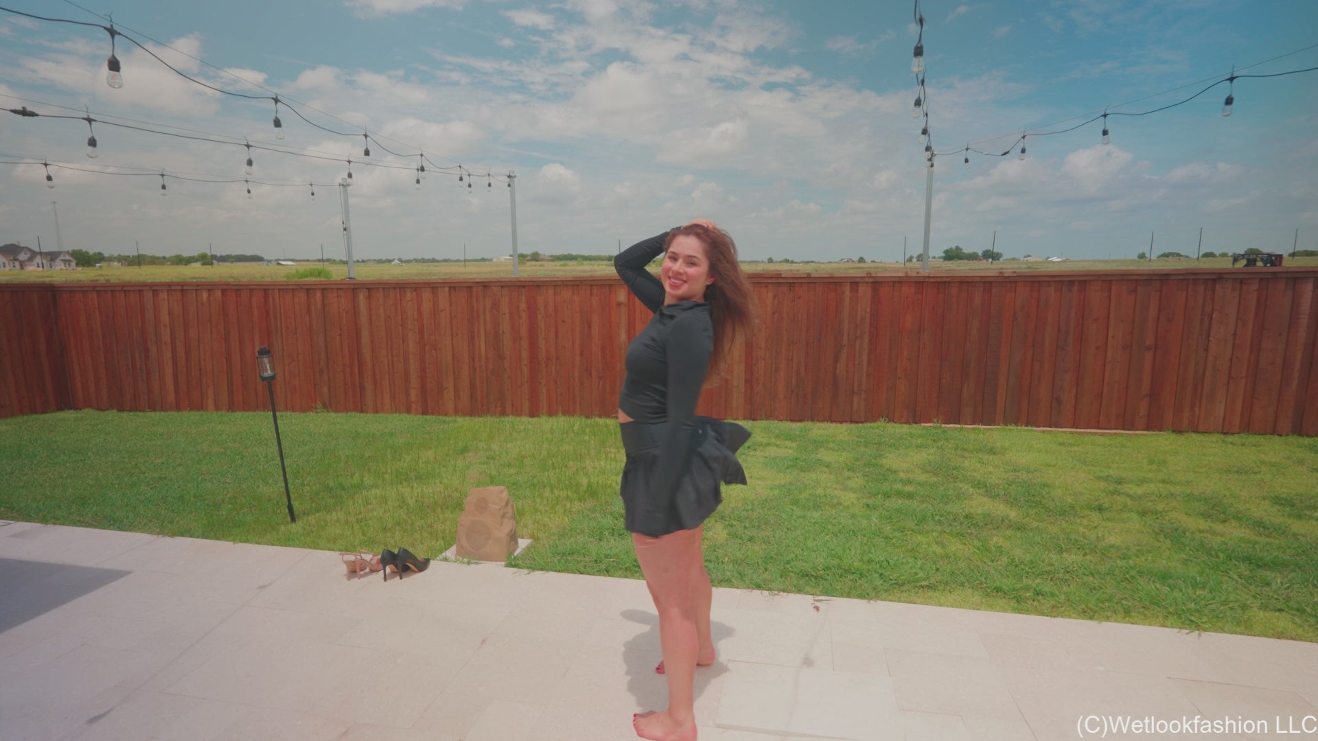 Samantha Takes a Barefoot Swim in a Sporty Skirt Outfit