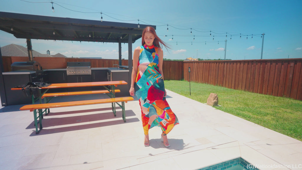 Taylor Falls in the Pool Wearing a Colorful Maxi Dress